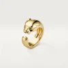 Anel Panthere De Cartier – Ouro amarelo, ônix, granada tsavorita – Cartier