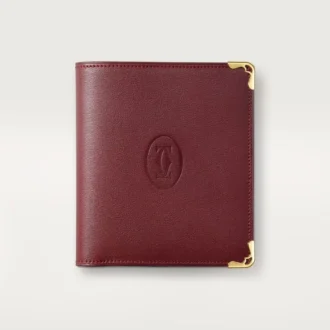 Carteira múltipla, Must de Cartier – Pele de bezerro cor de vinho, acabamento dourado – Cartier