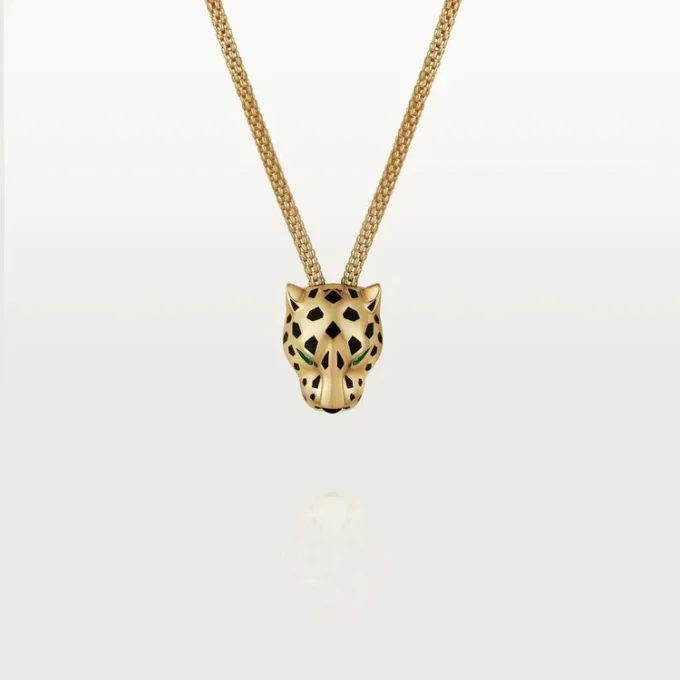 Colar Panthere De Cartier – Ouro amarelo, laca, diamantes, granada tsavorita, ônix – Cartier