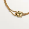 Colar Panthere De Cartier – Ouro amarelo, laca, diamantes, granada tsavorita, ônix – Cartier