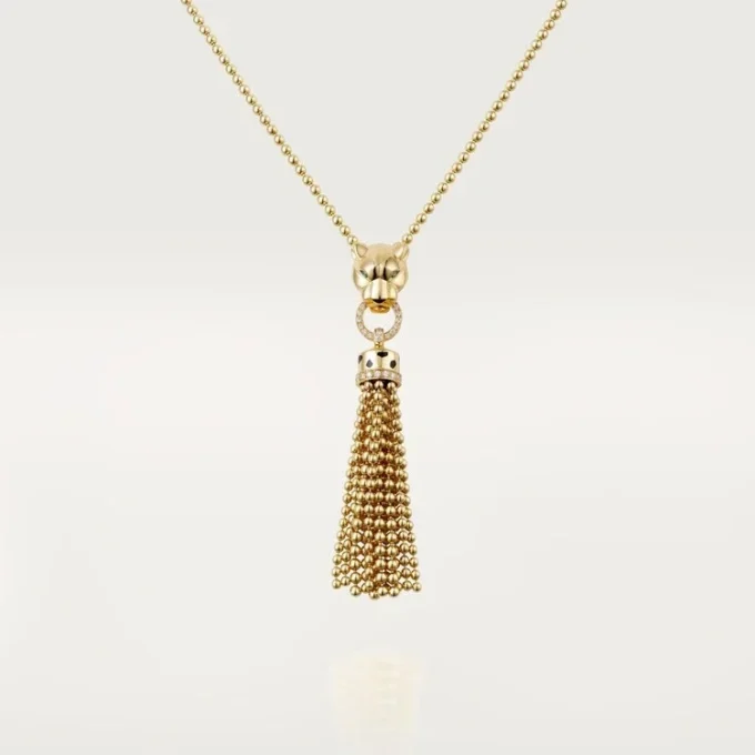 Colar Panthere De Cartier – Ouro amarelo, laca preta, granadas tsavoritas, ônix, diamantes – Cartier
