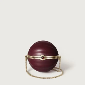 Mala redonda com motivo gadroon, Cartier Soir
