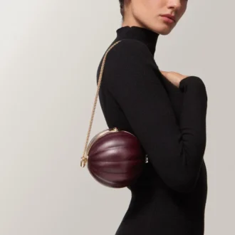 Mala redonda com motivo gadroon, Cartier Soir