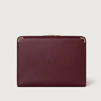 Portfólio, Must De Cartier – Pele de bezerro cor de vinho, acabamento dourado – Cartier