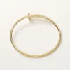Pulseira Juste Un Clou, modelo pequeno, diamantes com cravação invertida