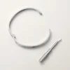Pulseira Love, modelo médio, 4 diamantes
